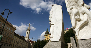The Augustinerkirche or Augustinian Church in Vienna in the background of Alfred Hrdlicka's anti-war and anti-Fascism memorial