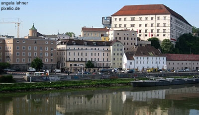 Boats on the Danube near Linz allow cruises in Upper Austria